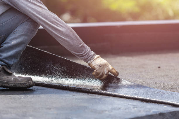 Professional Waterproofing technician working in Grand Island, NY